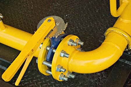 Yellow Gas main pipes and a valve