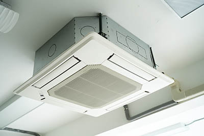 Split system air conditioning unit